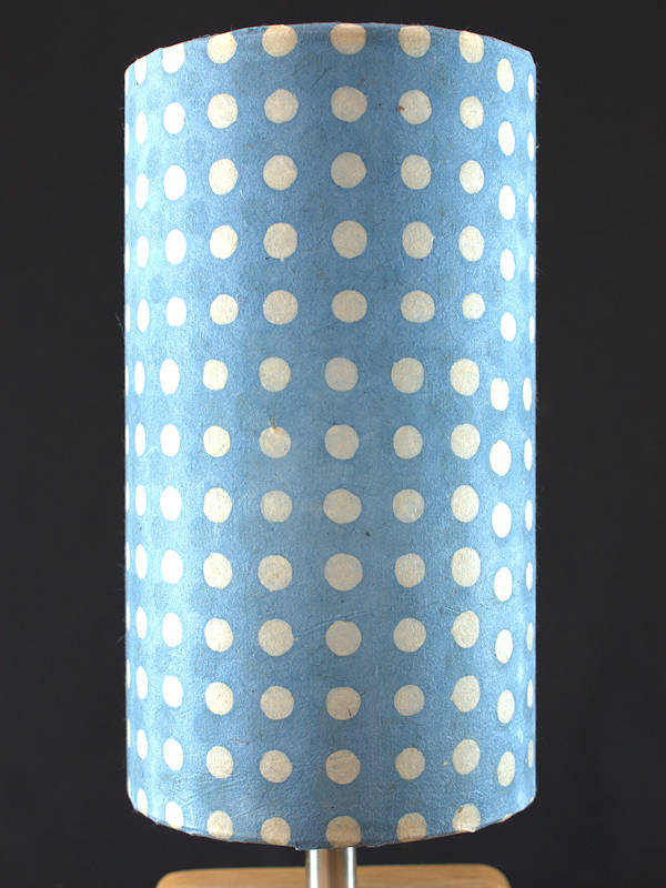 Small cylinder lampshade in sky-blue lokta fibres with white batik dots