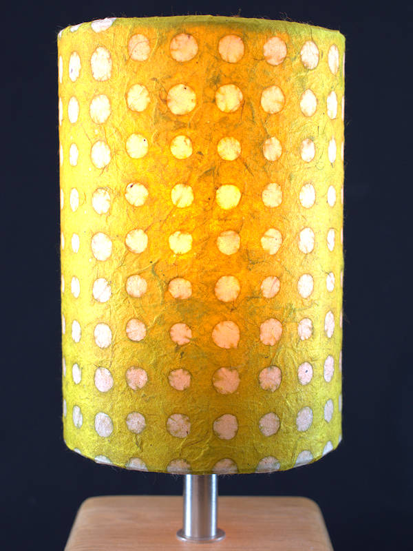 Small cylinder lampshade in lime green lokta fibre paper with white batik dots