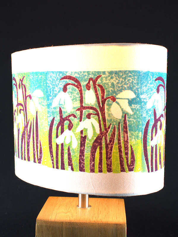 Oval lampshade in teal and aubergine snowdrops